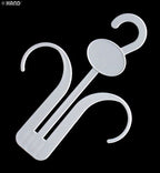 Pack of 10 plastic white shoe display hangers on a rack