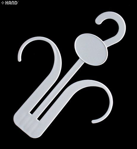 Pack of 10 plastic white shoe display hangers on a rack