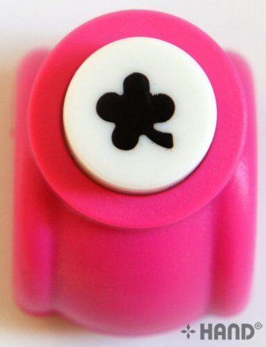 Four leaf clover craft paper punch on a white background.