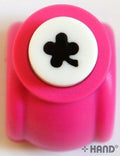 Four leaf clover craft paper punch on a white background.