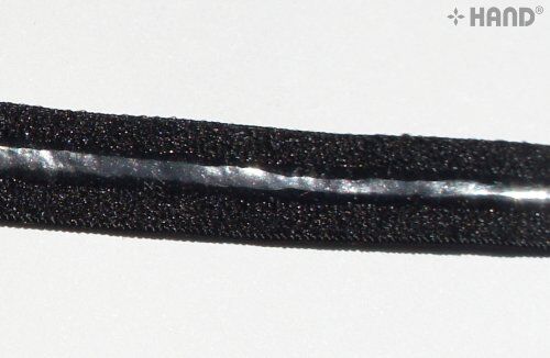 Roll of black elastic gel stop tape with measurement details.