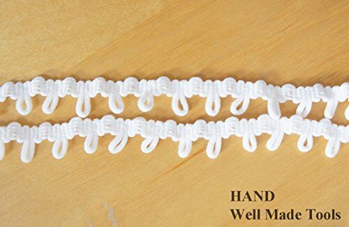 Close-up of white nylon loop trim showcasing its texture.