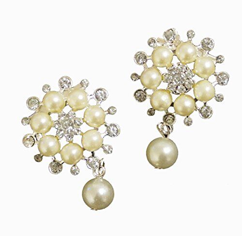 Two elegant pearl and clear crystal brooches displayed together.