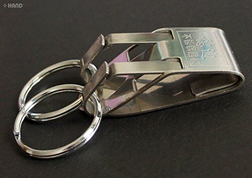 Keyring buckle displayed with a measuring tape for size reference