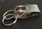 Keyring buckle displayed with a measuring tape for size reference