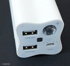 Power bank in use with an iPad and camera