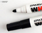 Close-up of the tip of a red bullet point whiteboard marker.