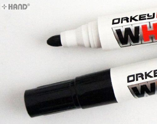 Close-up of the tip of a red bullet point whiteboard marker.