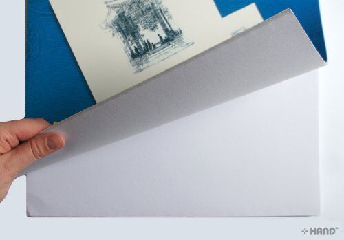 Stack of A3 hardback sketch books on a table