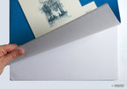 Stack of A3 hardback sketch books on a table