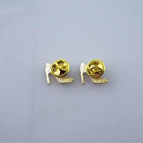 Two gold tone stiletto shoe brooches displayed together