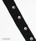 Roll of silver eyelets cotton black tape, 10 metres long.