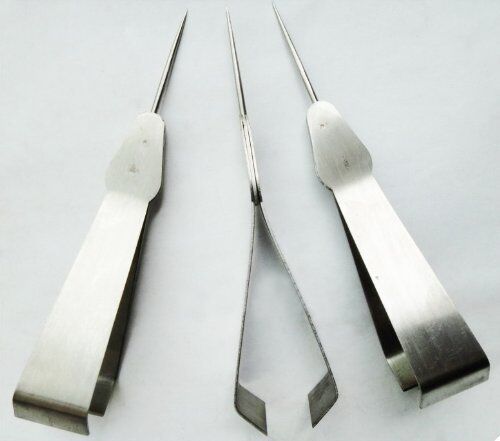 Close-up of the fabric picker showing the tweezers and awl features