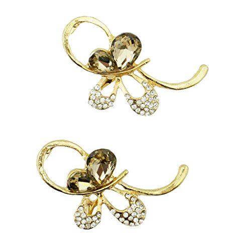 Gold tone butterfly brooch with rhinestones, elegant design.