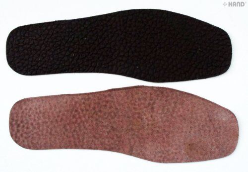 Close-up of the soft texture of the dark brown leather insole.