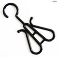 Pack of 10 plastic black shoe display hangers on a rack