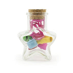 Star shaped glass bottle with cork stopper and jingle bells