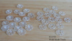 Clear plastic clip buttons arranged neatly for easy viewing.