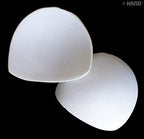 Bra pads in a package, showcasing their shape and design.