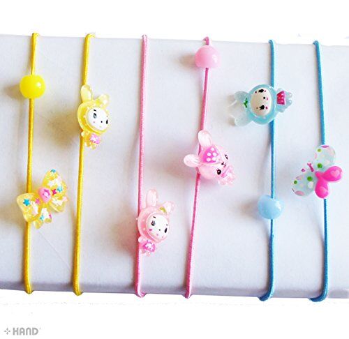 A set of hair bands featuring polka dots and stripes.