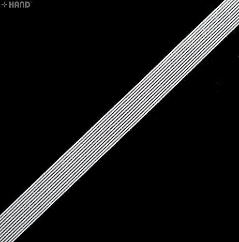 Off white stripy delicate thin flat underwear elastic on a roll.