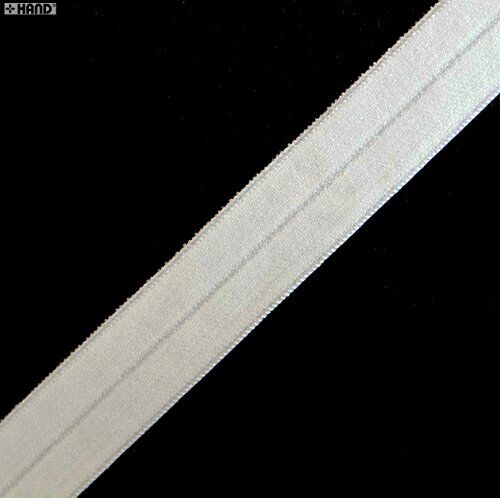 Off white satin surface knitted elastic binding on a roll