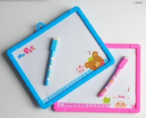 Two colourful dry erase boards for children on a white background.