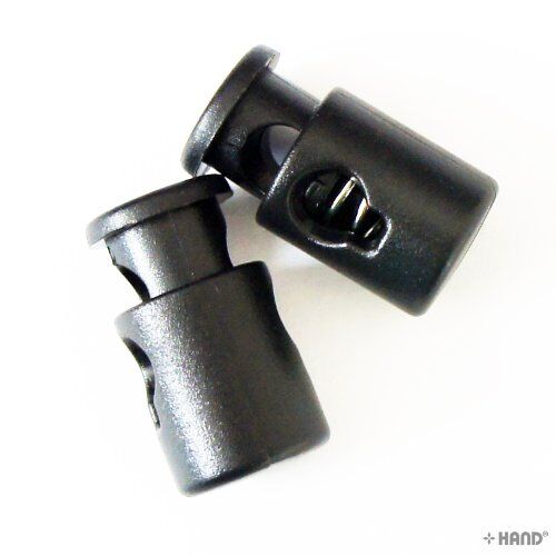 Close-up of a single plastic toggle spring stop cord lock