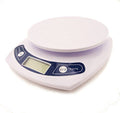 Electronic postal scale displaying weight in grams.