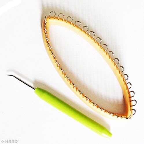 User demonstrating the peg knitting loom in action
