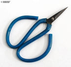 Scissors cutting through fabric with ease