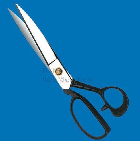 Close-up of the sharp blades of the tailoring scissors.