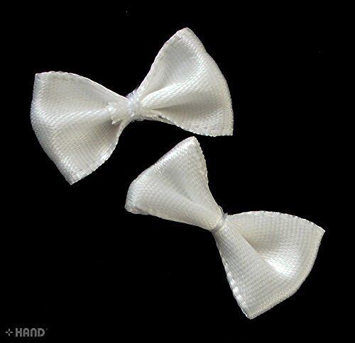 Display of white satin ribbon bows in various angles