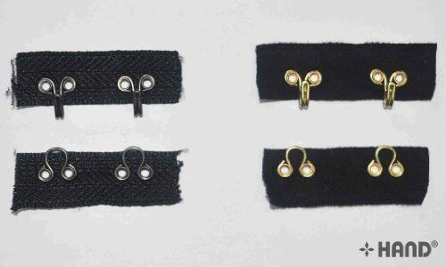 Close-up of the 4cm wide heavy weight hook and eye tape in gold.