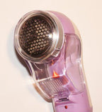 Mini cleaning brush included with the lint remover