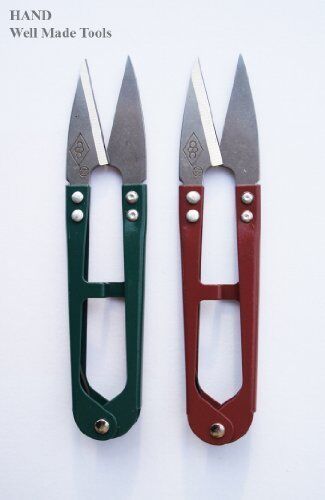 Unpicking snips featuring a sharp blade for easy thread removal.