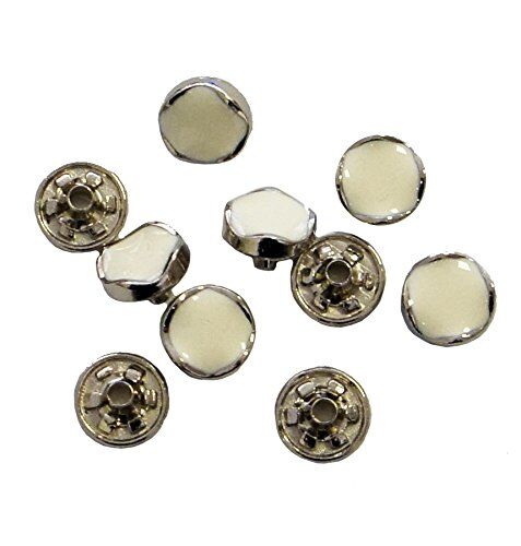 Decorative silver and white press studs displayed in pack.