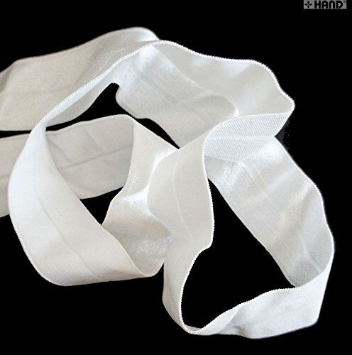 Close-up of 25mm wide off white elastic for sewing projects