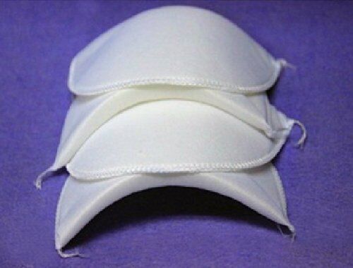 Close-up view of light weight shoulder pads in white.