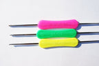 Crochet hook held comfortably in hand with flat body design