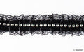 Black lace ribbon trim featuring sparkling diamante gems.