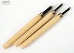 Chisels displayed with their wooden handles highlighting craftsmanship.