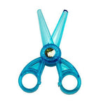 Close-up of the cat motif on the safety scissors