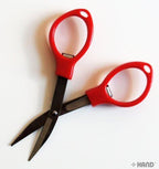 Scissors in a travel pouch for easy portability
