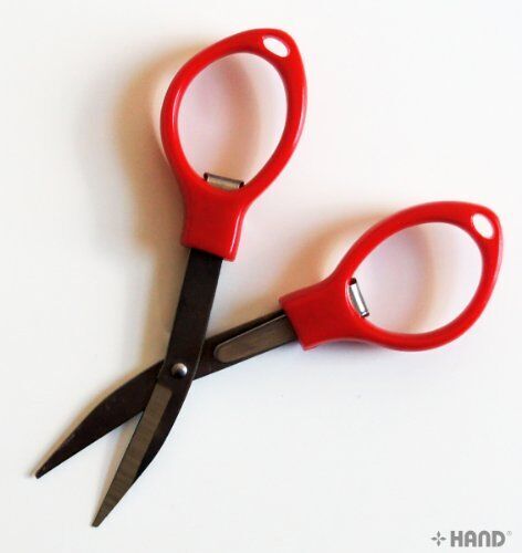Scissors in a travel pouch for easy portability