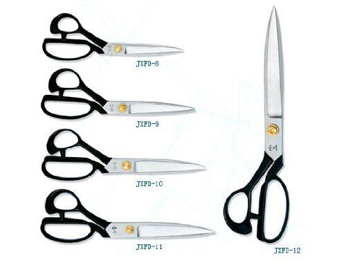 Tailoring scissors displayed on a cutting mat with fabric