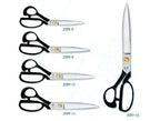Tailoring scissors displayed on a cutting mat with fabric