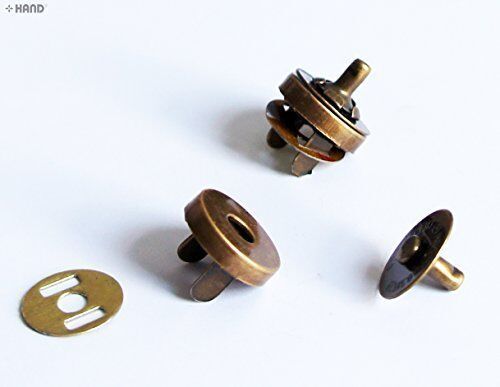 Antique gold magnetic buttons displayed on a white background.