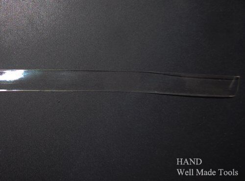 Roll of clear flat crystal shoulder strap showing 50 metres.