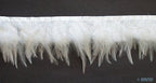 Close-up of natural white duck feathers stitched onto trim.